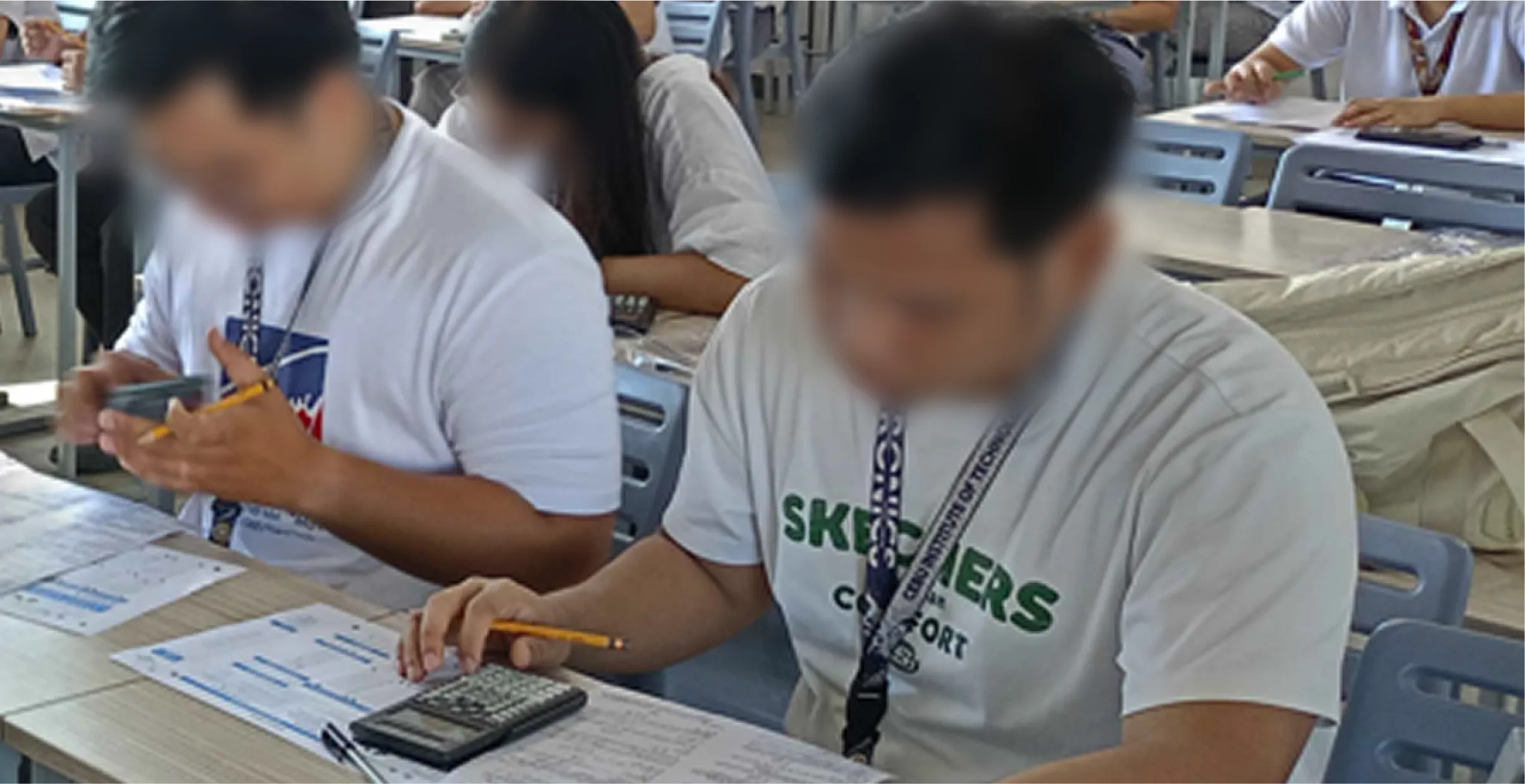 CIT-U students answering an exam on GradeChum answer sheets