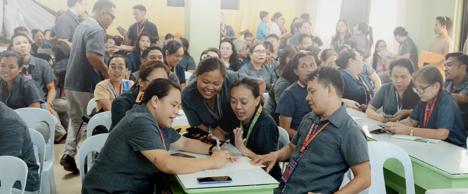 DepEd Region VII teachers collaborating during a GradeChum training session